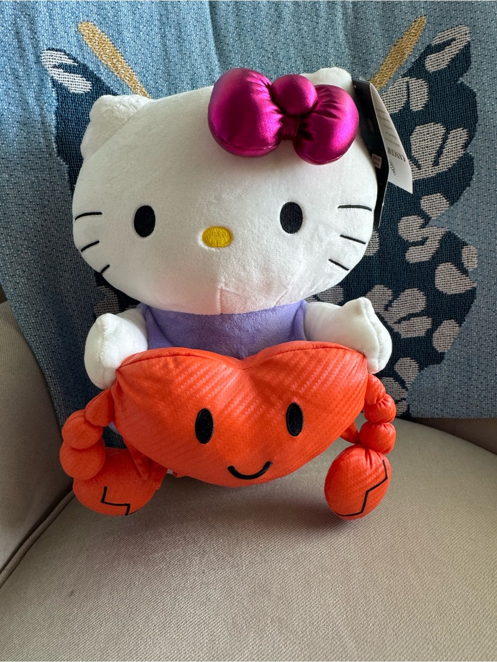 Sanrio Hello Kitty Plush Toy with Pink Bow and Orange Heart Crab